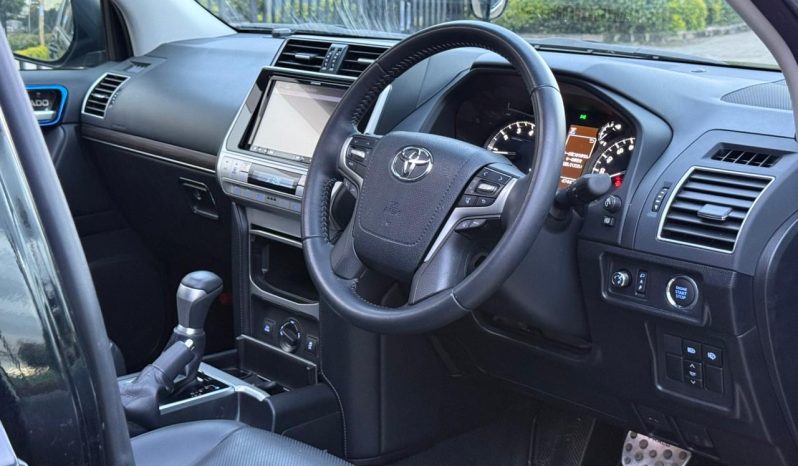 
								Toyota Land Cruiser Prado TXL full									