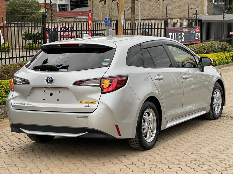 
								Toyota Corolla Touring full									